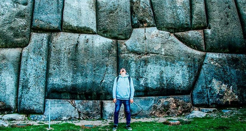 Tourist in Saqsaywaman in Cusco